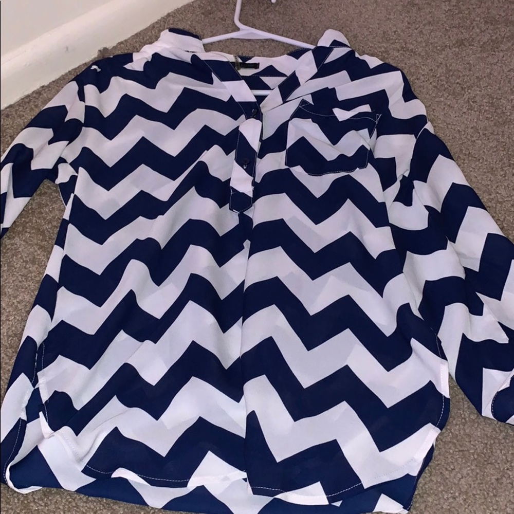 a navy blue and white blouse